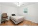 This bedroom features hardwood floors, ceiling fan and a window providing natural light at 4412 Dobys Bridge Rd, Fort Mill, SC 29707