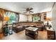 This cozy living room features hardwood floors, a large sectional sofa, and two side tables with lamps at 4412 Dobys Bridge Rd, Fort Mill, SC 29707