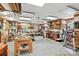Spacious workshop with ample lighting and numerous work stations, ideal for hobbyists and DIY enthusiasts at 4412 Dobys Bridge Rd, Fort Mill, SC 29707