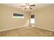 Bedroom with carpet, ceiling fan, and two windows at 458 Leaf Arbor Ct, Clover, SC 29710