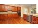 Gourmet kitchen with custom wood cabinetry, granite countertops, and stainless steel appliances at 458 Leaf Arbor Ct, Clover, SC 29710