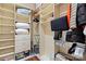 Spacious walk-in closet with custom shelving, drawers, and ample storage for clothes and accessories at 4625 Piedmont Row Dr # 712, Charlotte, NC 28210
