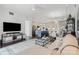 Inviting living room with open layout, seamlessly connected to the dining area and modern kitchen at 4625 Piedmont Row Dr # 712, Charlotte, NC 28210