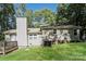 This house showcases a spacious backyard, deck, and lush green grass, perfect for relaxation and outdoor activities at 4937 Post Oak Ln, Rock Hill, SC 29732