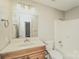 This bathroom features a vanity sink, modern fixtures, and a shower-tub combo, providing a comfortable space at 4937 Post Oak Ln, Rock Hill, SC 29732