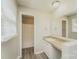 This well-lit bathroom features a vanity sink, modern fixtures, and a shower-tub combo, offering convenience and style at 4937 Post Oak Ln, Rock Hill, SC 29732