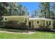 Charming single-story home with a well-maintained lawn and mature landscaping, offering great curb appeal at 4937 Post Oak Ln, Rock Hill, SC 29732