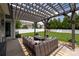 Landscaped backyard featuring a pergola and a large fenced-in yard at 5042 Alston Dr, Lancaster, SC 29720