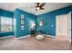 Charming bedroom with large window and blue accent wall at 5042 Alston Dr, Lancaster, SC 29720