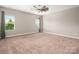 Neutral bedroom showcasing plush carpet and lots of natural light at 5042 Alston Dr, Lancaster, SC 29720