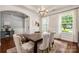 Dining room with hardwood floors, abundant natural light, and classic decor, creating an inviting space for meals at 5042 Alston Dr, Lancaster, SC 29720