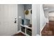 Inviting entryway with coat rack, bench, and storage baskets creates a welcoming first impression to the home at 5042 Alston Dr, Lancaster, SC 29720