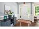 Elegant foyer with hardwood floors, decorative accents, and natural light, offering a grand entrance to the home at 5042 Alston Dr, Lancaster, SC 29720