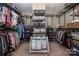 Large walk-in closet with extensive shelving and hanging space provides ample storage solutions for clothes and accessories at 5042 Alston Dr, Lancaster, SC 29720