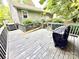 Large deck with grill and view of yard offers a relaxing outdoor space at 6007 Crosswood Ct, Charlotte, NC 28215