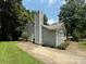 View of the property's side exterior showcasing the driveway at 6007 Crosswood Ct, Charlotte, NC 28215