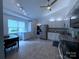 Spacious kitchen featuring modern stainless-steel appliances, granite countertops, and tile floors at 6007 Crosswood Ct, Charlotte, NC 28215