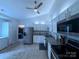Well-lit kitchen with granite countertops, stainless steel appliances, and lots of cabinet space at 6007 Crosswood Ct, Charlotte, NC 28215