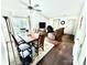 Bright living and dining area with hardwood floors, complemented by a sliding glass door at 6007 Crosswood Ct, Charlotte, NC 28215