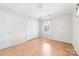 Bedroom with hardwood floors, closet and a window at 611 Church St, Belmont, NC 28012