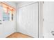 Entryway with hardwood floors, coat closet and a door with window at 611 Church St, Belmont, NC 28012