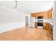 Open kitchen offering laminate floors and white appliances at 611 Church St, Belmont, NC 28012