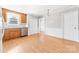 Spacious kitchen offering laminate floors and stainless steel dishwasher at 611 Church St, Belmont, NC 28012