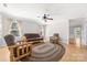 Spacious living room offering wood laminate flooring, comfortable seating, and ample natural light at 611 Church St, Belmont, NC 28012