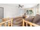 Inviting living room with wood laminate flooring, rustic log furniture, and plenty of natural light at 611 Church St, Belmont, NC 28012