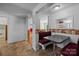 Cozy breakfast nook with booth seating, decorative wallpaper, and access to other rooms at 7011 S Providence Rd, Waxhaw, NC 28173