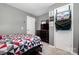 Neutral bedroom featuring light walls, modern decor, and natural light from the window at 704 Willow Rd, Salisbury, NC 28147
