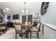 Cozy dining area featuring a wooden table set with seating for four under decorative light fixture at 704 Willow Rd, Salisbury, NC 28147