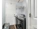 Well-lit laundry room featuring modern washer and dryer units and functional storage solutions at 704 Willow Rd, Salisbury, NC 28147