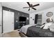 Comfortable main bedroom with a television, modern decor, and ample natural light at 704 Willow Rd, Salisbury, NC 28147