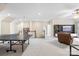 Spacious basement area with a ping pong table, recessed lighting, and a cozy seating area for entertainment at 7229 Olde Sycamore Dr, Mint Hill, NC 28227