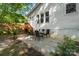 Outdoor patio area, perfect for entertaining, surrounded by lush greenery and ample space at 772 Eden Ter, Rock Hill, SC 29730