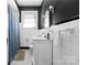 Classic black and white bathroom with a marble vanity and tiled walls with modern fixtures at 772 Eden Ter, Rock Hill, SC 29730