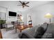 Comfortable living room featuring a brick fireplace and open access to a hallway at 772 Eden Ter, Rock Hill, SC 29730
