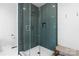 Modern tiled shower with glass door, rainfall showerhead, and convenient built-in niche at 772 Eden Ter, Rock Hill, SC 29730