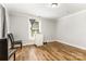 Neutral bedroom with wood floors at 822 Cantwell St, Charlotte, NC 28208