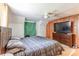 Cozy bedroom with natural light, closet, and comfortable queen-sized bed at 904 Venus St, Kannapolis, NC 28083