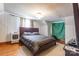Serene bedroom featuring hardwood floors, a comfy queen size bed, and window at 904 Venus St, Kannapolis, NC 28083