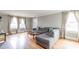 Comfortable living room with hardwood floors, natural light, and a cozy sectional sofa at 904 Venus St, Kannapolis, NC 28083