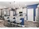 Stylish kitchen with granite countertops, stainless steel appliances, a center island, and pendant lighting at 9541 Festival Way, Charlotte, NC 28215
