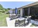 Outdoor patio with comfortable seating and a serene backyard view at 9541 Festival Way, Charlotte, NC 28215
