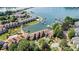 Stunning aerial view of waterfront condos with boat docks and lush landscaping by Lake Norman at 1007 Southwest Dr, Davidson, NC 28036
