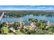Expansive aerial view of condos near Lake Norman surrounded by lush trees and tranquil waterways at 1007 Southwest Dr, Davidson, NC 28036