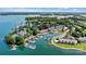 A captivating aerial shot showcases waterfront condo community with private boat docks and serene lake views at 1007 Southwest Dr, Davidson, NC 28036