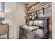 Stylish bar area with rustic wood shelving and mirrored accents at 1007 Southwest Dr, Davidson, NC 28036