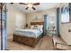 Cozy bedroom features a wood frame bed, curtains, and side tables with lamps at 1007 Southwest Dr, Davidson, NC 28036